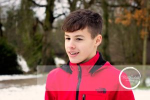 coloured portrait of a young man on location in Ballymena at a Family Photography Shoot