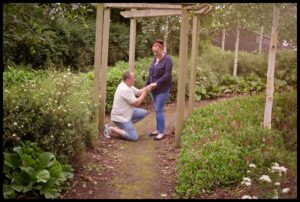 Young couple gets engaged in the wood in Belfast